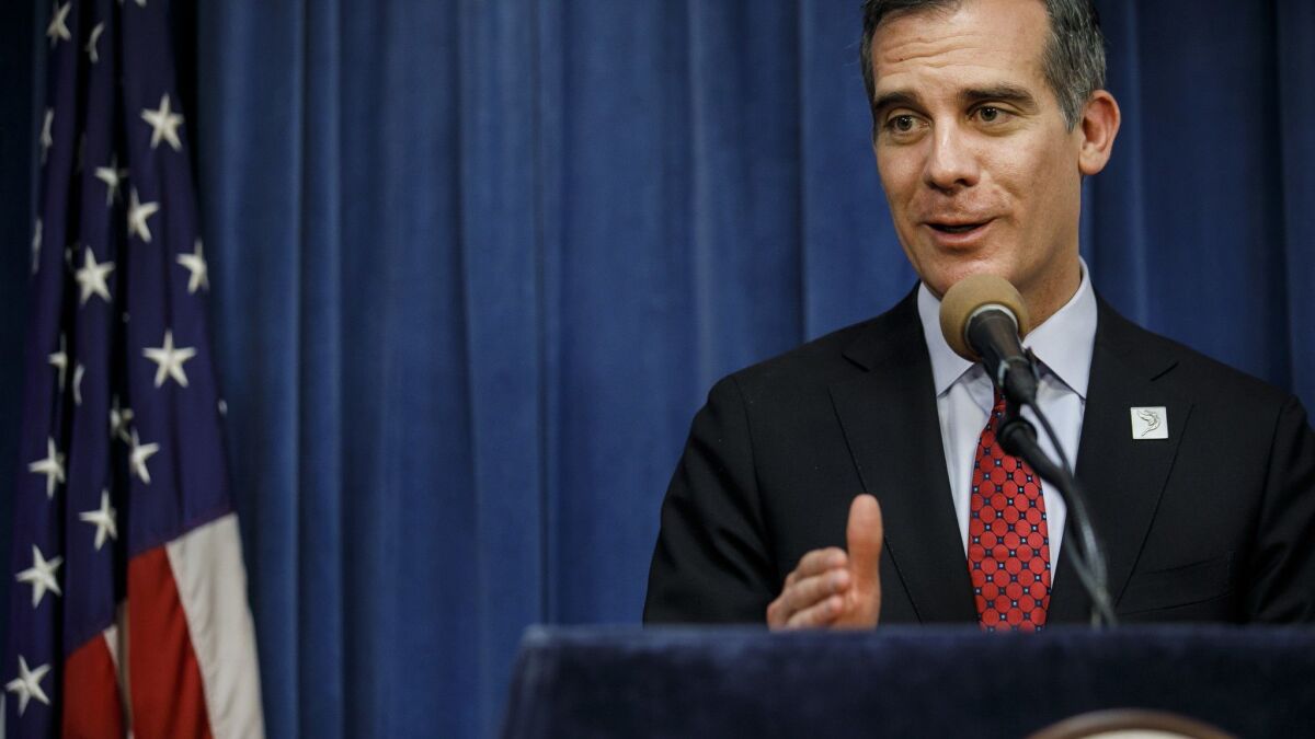Los Angeles Mayor Eric Garcetti answer questions during a press conference in Los Angeles, Calif. on May 3.