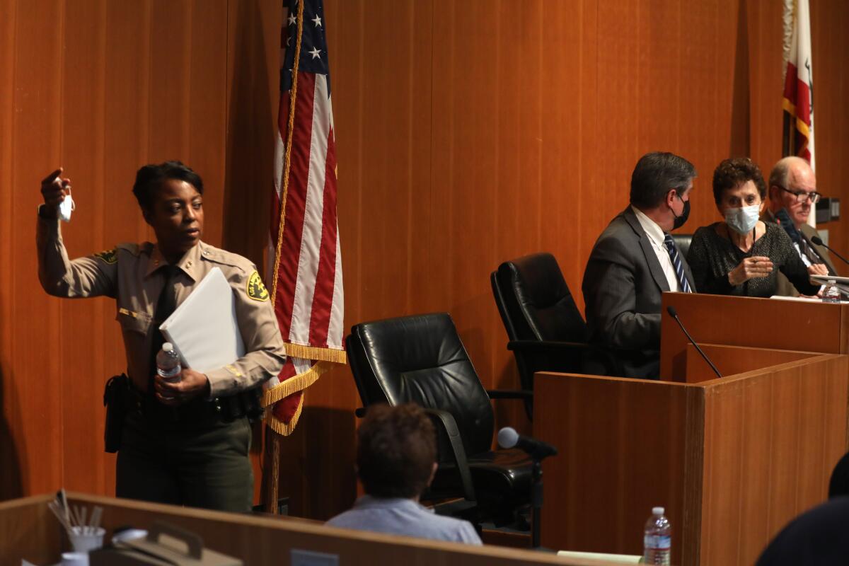 Then-Chief April Tardy, now undersheriff of Los Angeles County, answered questions during a public hearing on deputy gangs