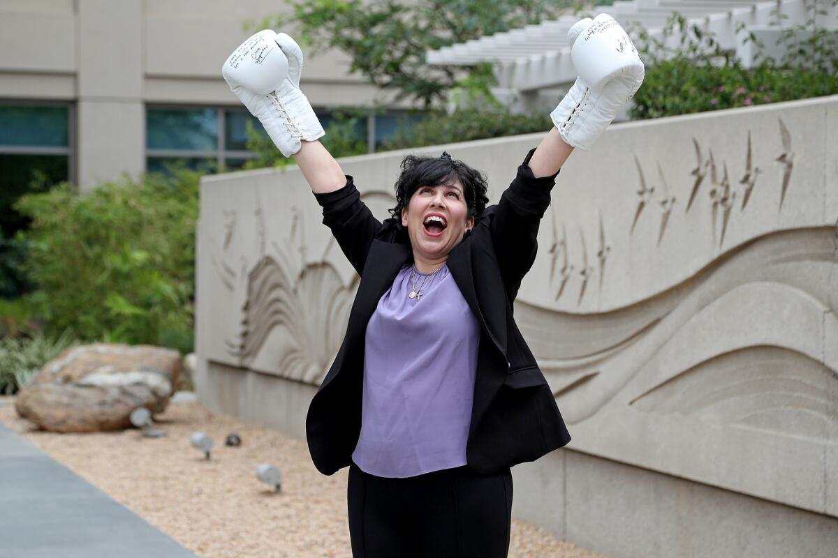 Newport Coast resident Laurie Paolone outside Hoag Hospital on Wednesday.