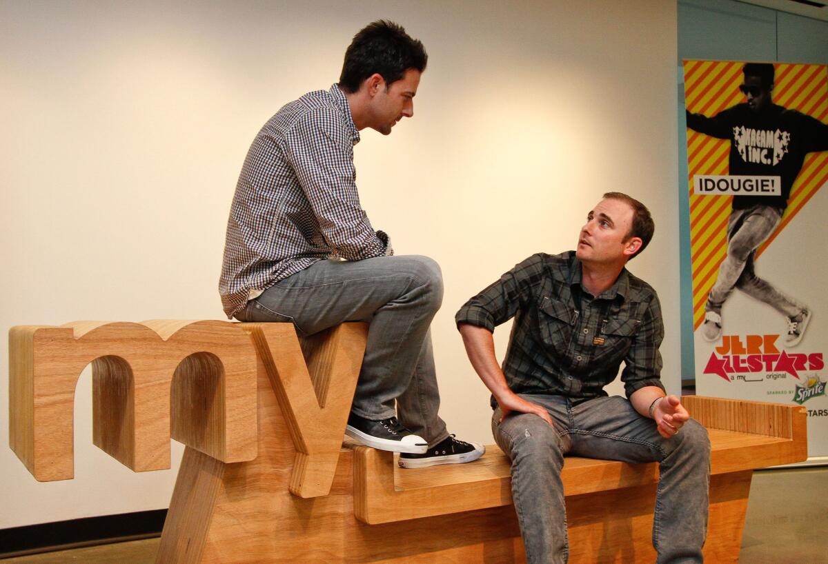 Viant co-founders Chris Vanderhook, left, and Tim Vanderhook at the headquarters of their Myspace division in Beverly Hills in 2011. (Ricardo DeAratanha / Los Angeles Times)
