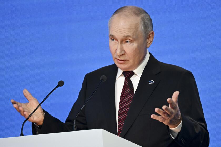 Russian President Vladimir Putin gestures while speaking at the annual meeting of the Valdai Discussion Club in the Black Sea resort of Sochi, Russia, Thursday, Oct. 5, 2023. (Grigory Sysoyev, Sputnik, Kremlin Pool Photo via AP)