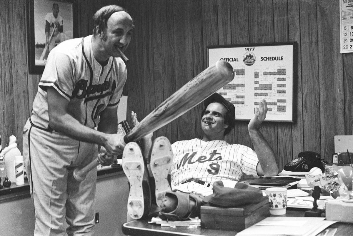 Frank Torre, left, clowns around with his brother Joe Torre, who was then manager of the New York Mets, at Shea Stadium in 1977.