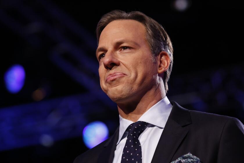 Jake Tapper moderates the Republican primary debate hosted by CNN