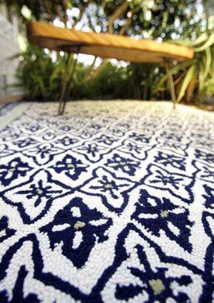 Got more ground to cover? This outdoor floor covering has the appearance of a wool tufted rug. From Grandin Road.
