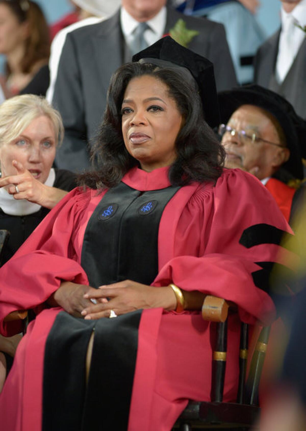 Oprah Winfrey, shown receiving an honorary doctorate last month at Harvard University, tops Forbes' list of the 100 most powerful celebrities.