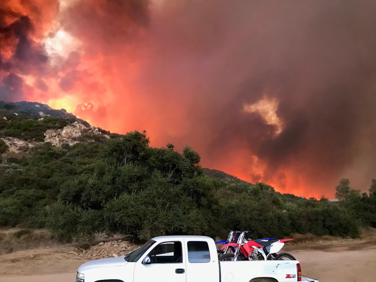 A fire burning burning in San Diego's back country