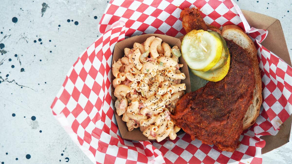The Howlin' Ray's howlin' hot chicken and a side of pimento mac salad.
