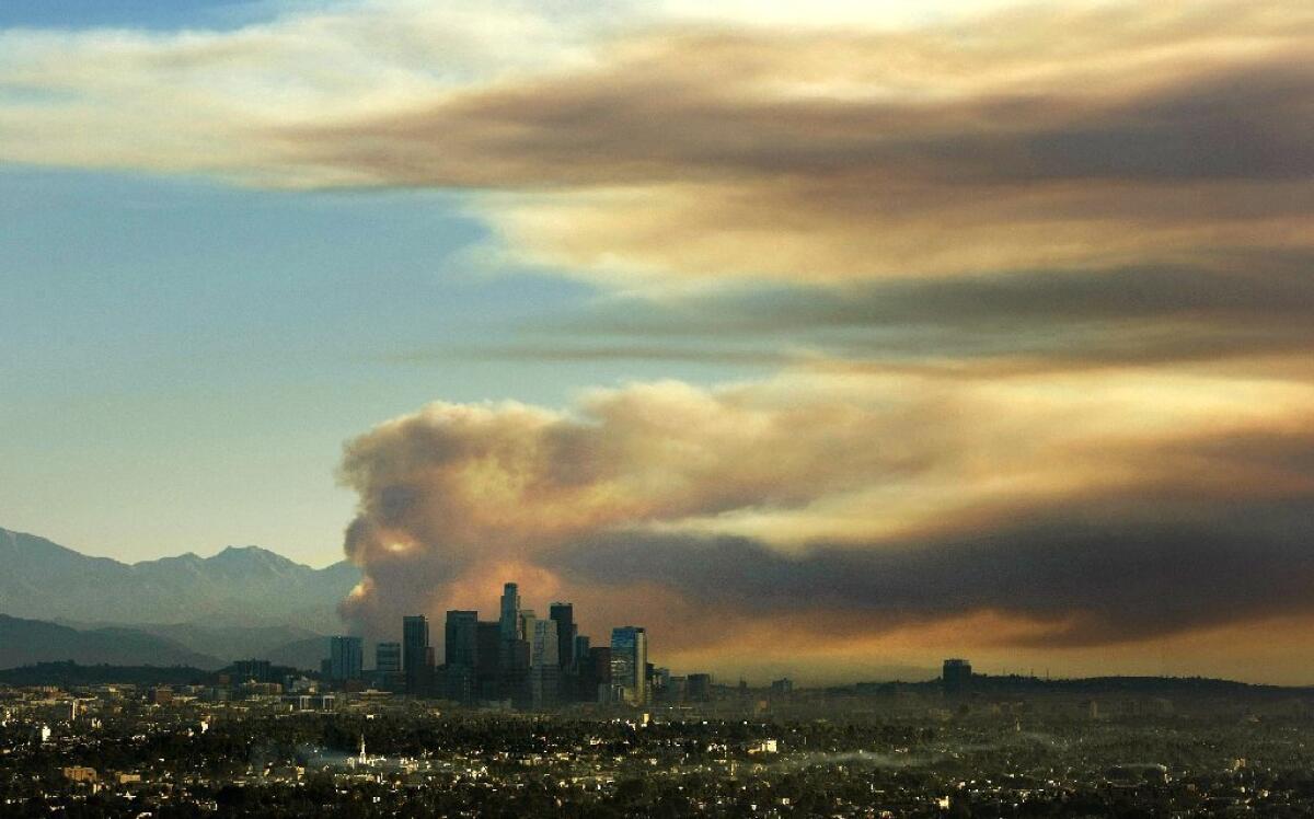 Smoke rises from the Colby fire near Los Angeles.