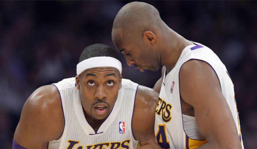 Kobe Bryant, right, is said to have confronted Dwight Howard at Lakers' practice Wednesday.