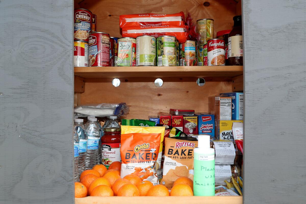 Inside of a help-yourself food pantry created by Huntington Beach resident Malcolm "Mac" Bishop.