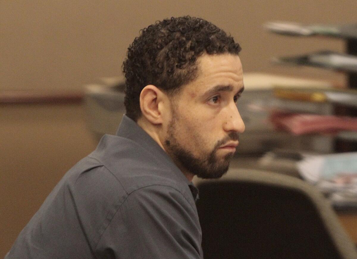 Alex Donald Jackson listens to testimony at his trial on murder charges in Los Angeles County Superior Court in Lancaster.