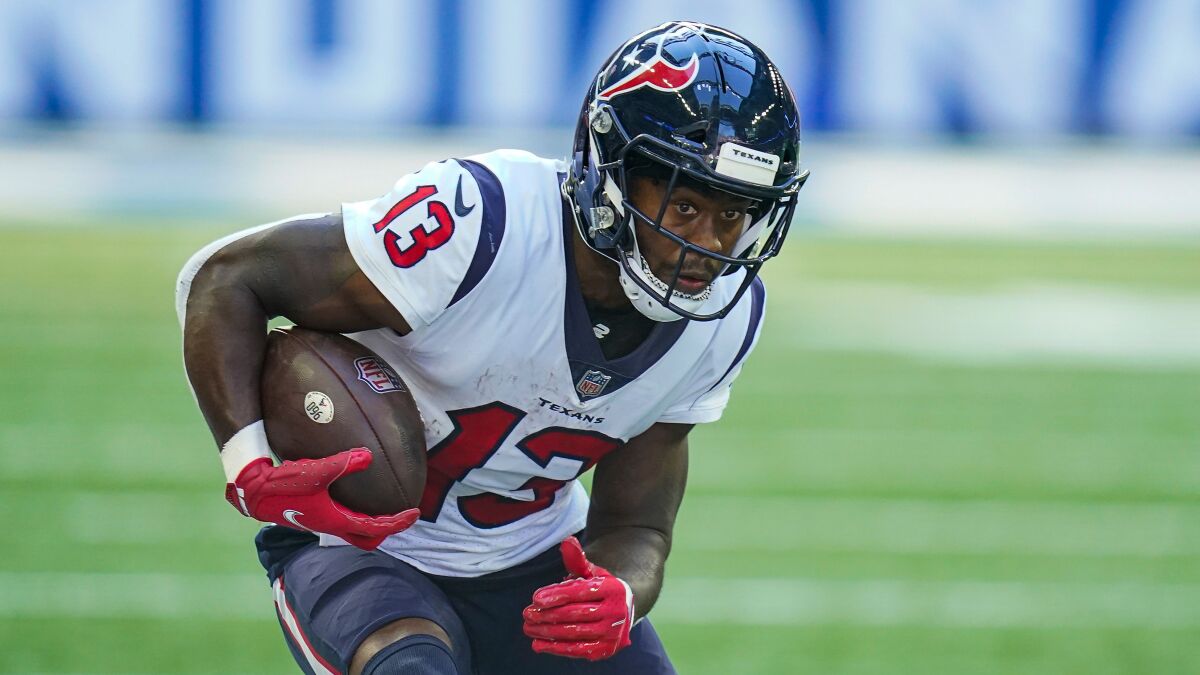 Houston Texans wide receiver Brandin Cooks runs with the ball against the Indianapolis Colts on Oct. 17.