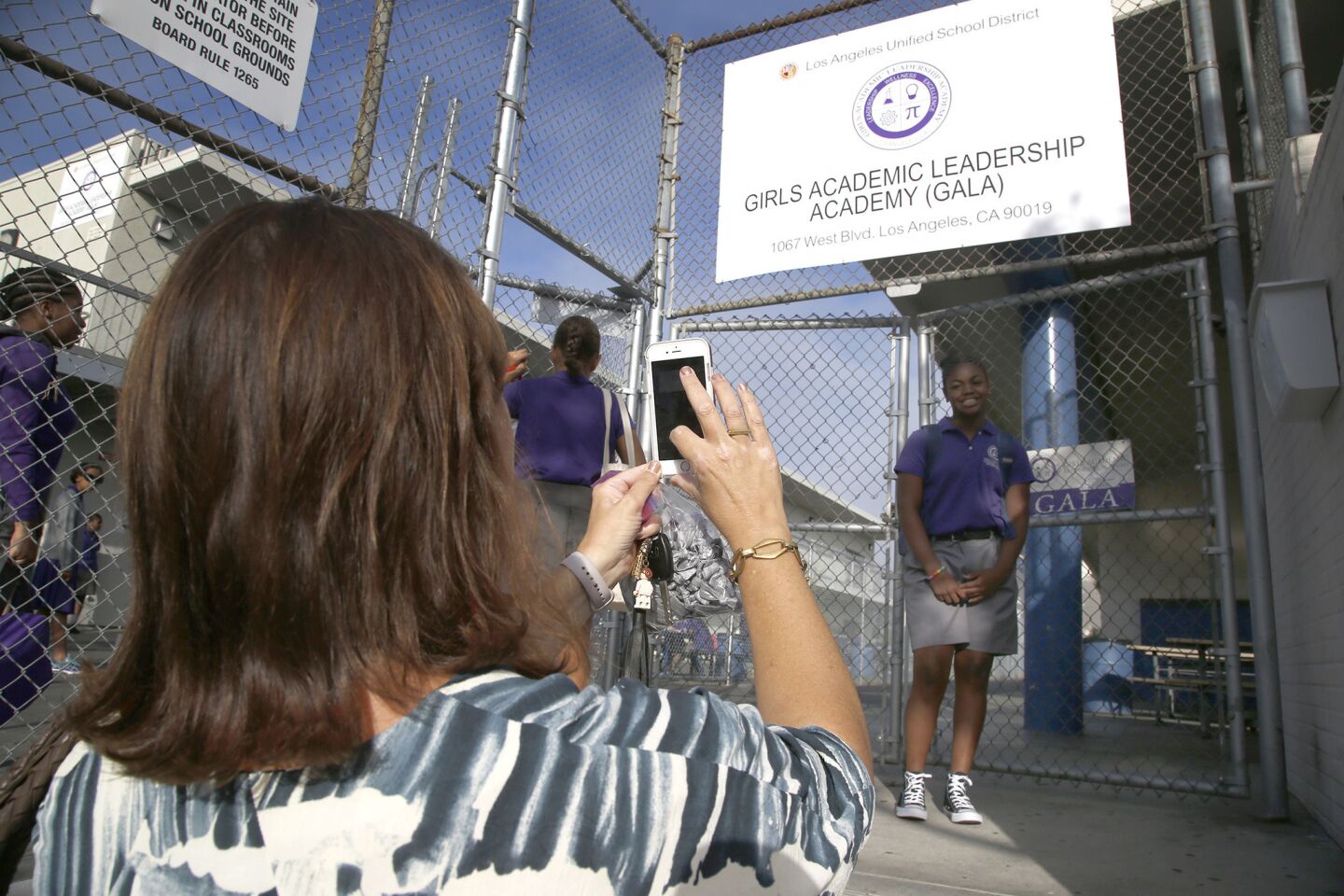 Lots of photos are taken at the front gates of the academy. The school is housed at Los Angeles High in Mid-Wilshire.