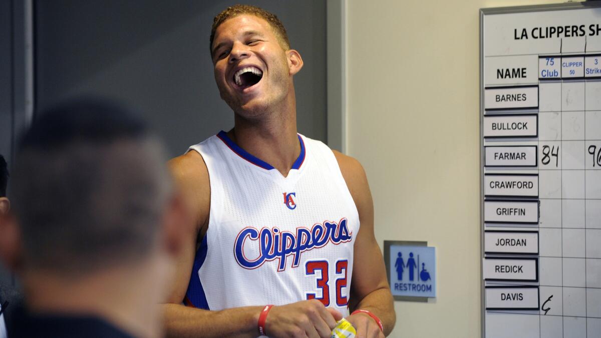Clippers power forward Blake Griffin laughs while taking part in the team's media day Monday.