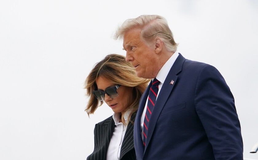 President Trump and First Lady Melania Trump step off Air Force One.