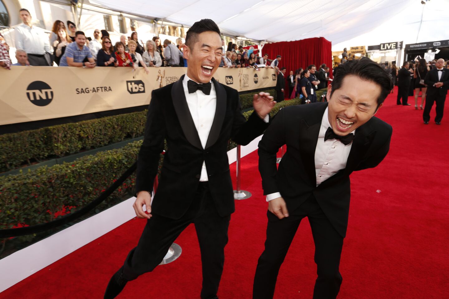 Leonardo Nam, nominated with his cast mates in "Westworld," and Steven Yeun attend.