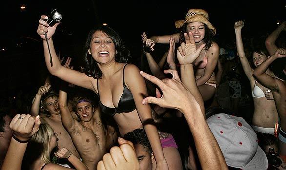 UCLA junior Jasmine Martinez rises above the crowd as students prepare for the 2008 Undie Run. The tension-reducing event, in which students make a midnight run across campus in their underwear, has become a finals week tradition at UCLA.