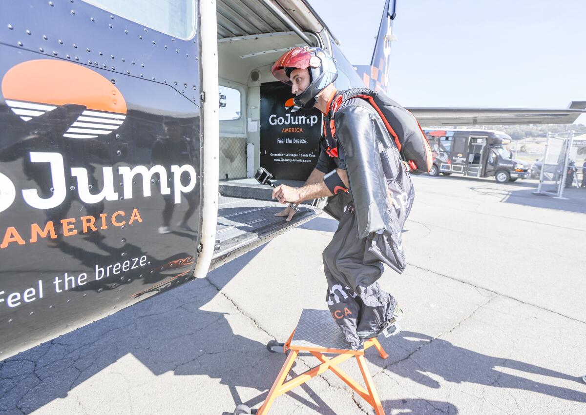 Skydiver Chris Geiler boards the plane to make a jump in his wingsuit at GoJump Oceanside.