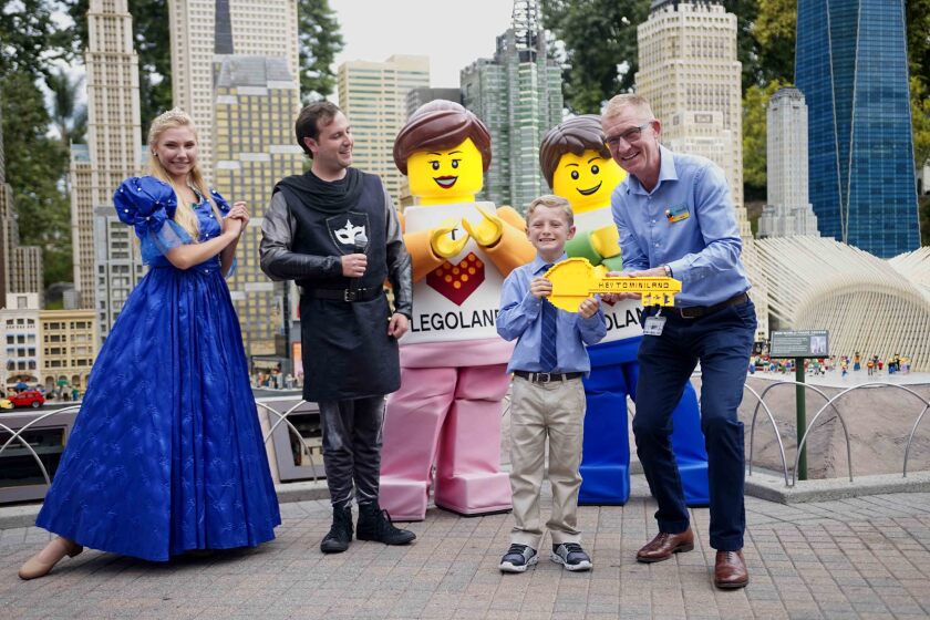 James Carlin, the new Mayor of Legoland California, with his Legoland “staff.”