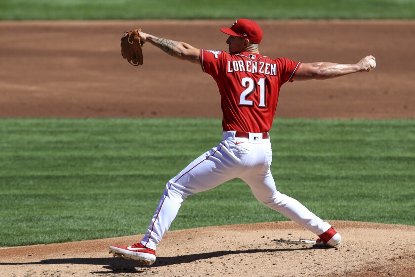 Cincinnati Reds' Michael Lorenzen throws in the second inning during a baseball game against the Chicago White Sox in Cincinnati, Sunday, Sept. 20, 2020. (AP Photo/Aaron Doster)
