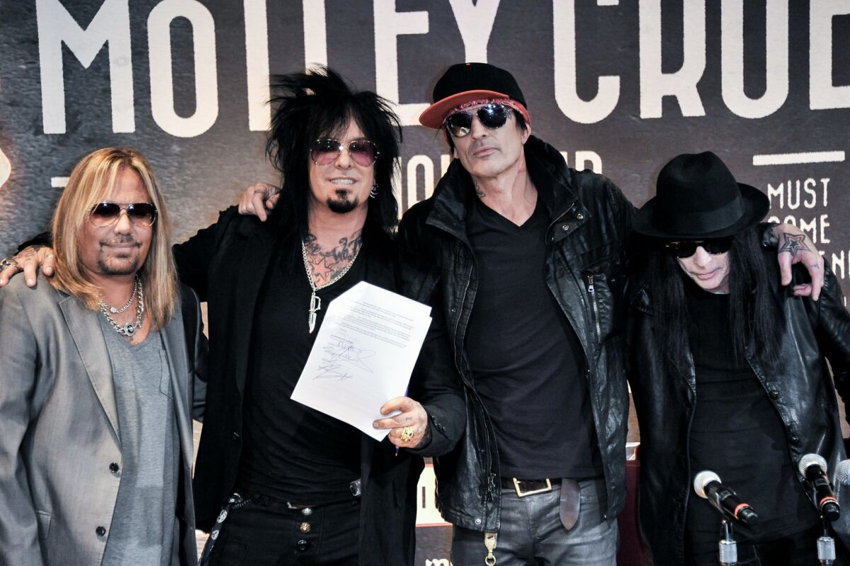 Vince Neil, Nikki Sixx, Tommy Lee, and Mick Mars of Motley Crue on Jan. 28, 2014, in Los Angeles. 