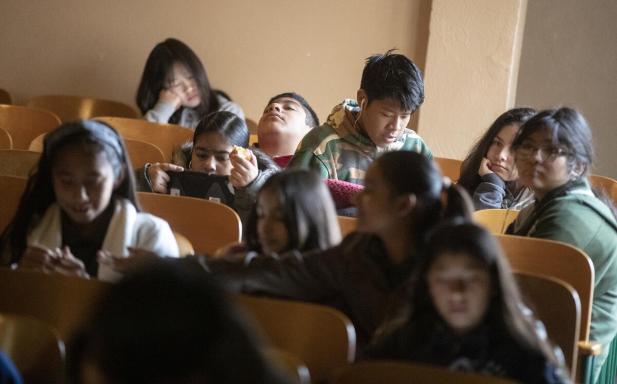 Upon arrival Wednesday, Burroughs Middle School students were assigned to a large space — multipurpose room, cafeteria, auditorium.