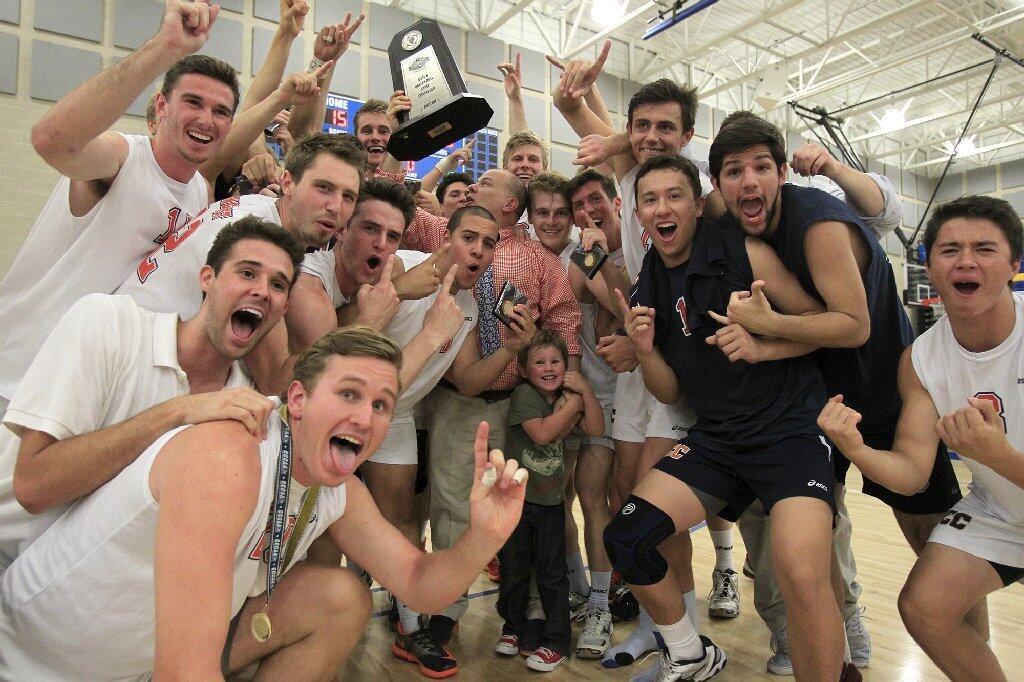 Orange Coast College celebrates beating Santa Monica in the 2014 California Community College Athletic Assn. State Championship match at Santiago Canyon College in Orange on Friday.