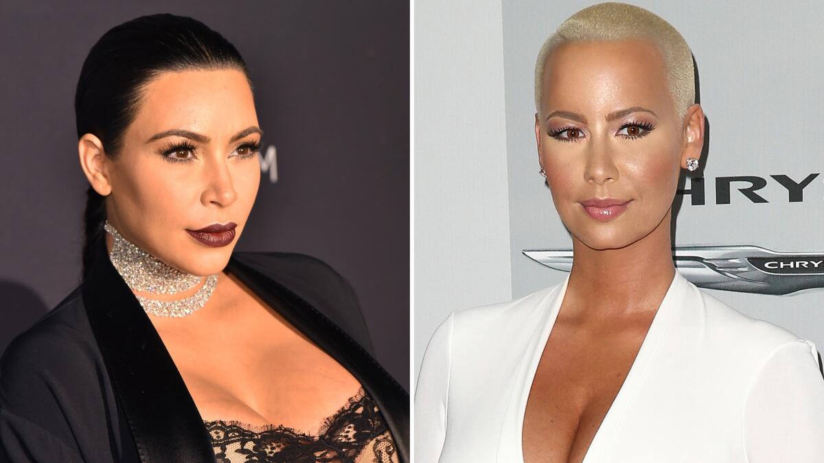 Kim Kardashian, left, and Amber Rose appear to squash the beef between feuding rappers Kanye West and Wiz Khalifa.