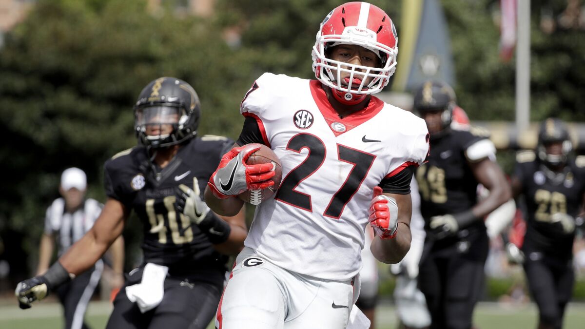 Nick Chubb and Georgia have dashed to an unbeaten season and No. 2 in the AP college football poll.