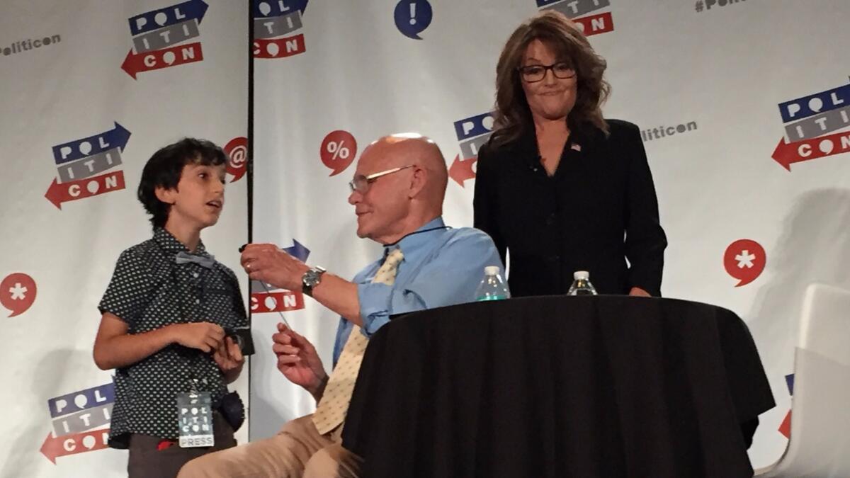 At Politicon, Tarzana fifth-grader Adam Chernick asks Sarah Palin, who had just been interviewed by James Carville, how she could endorse Donald Trump after his "sexist" remarks about Fox News anchor Megyn Kelly.