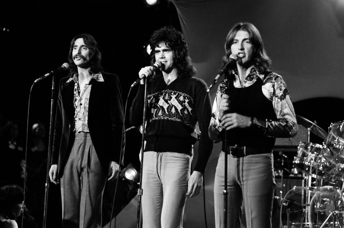 The members of Three Dog Night -- from left, Chuck Negron, Danny Hutton and Cory Wells -- perform at Dick Clark's New Year's Rockin' Eve in 1972.