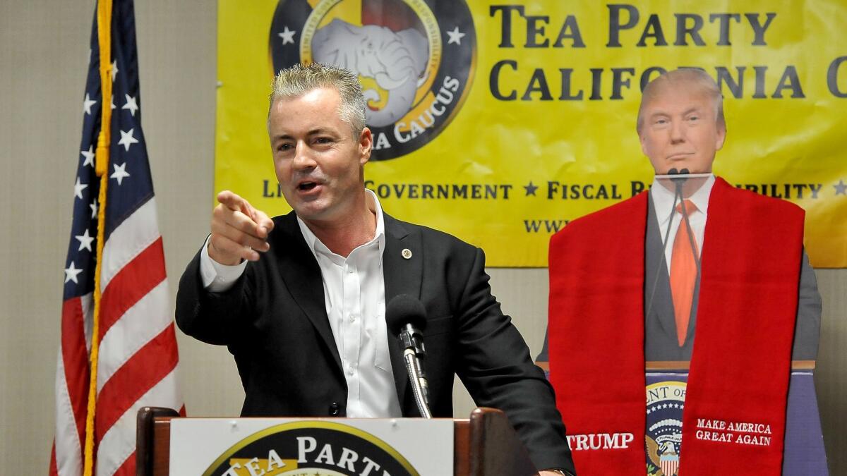 Republican gubernatorial candidate Travis Allen speaks on repealing the gas tax increase at a conference of the Tea Party California Caucus in Fresno last summer.