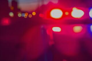 Red and blue Lights of police car in night time. Night patrolling the city. Abstract blurry image.