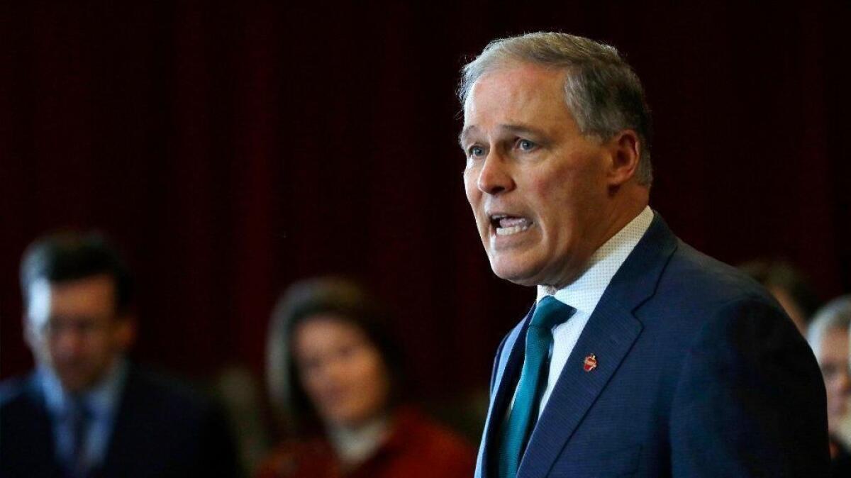 Washington Gov. Jay Inslee speaks Feb. 14 at an event in Seattle held by the Alliance for Gun Responsibility.