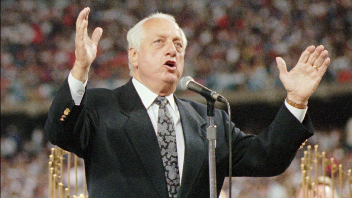 Tom Lasorda speaks during a ceremony held in his honor at Dodger Stadium on Sept. 7, 1996.