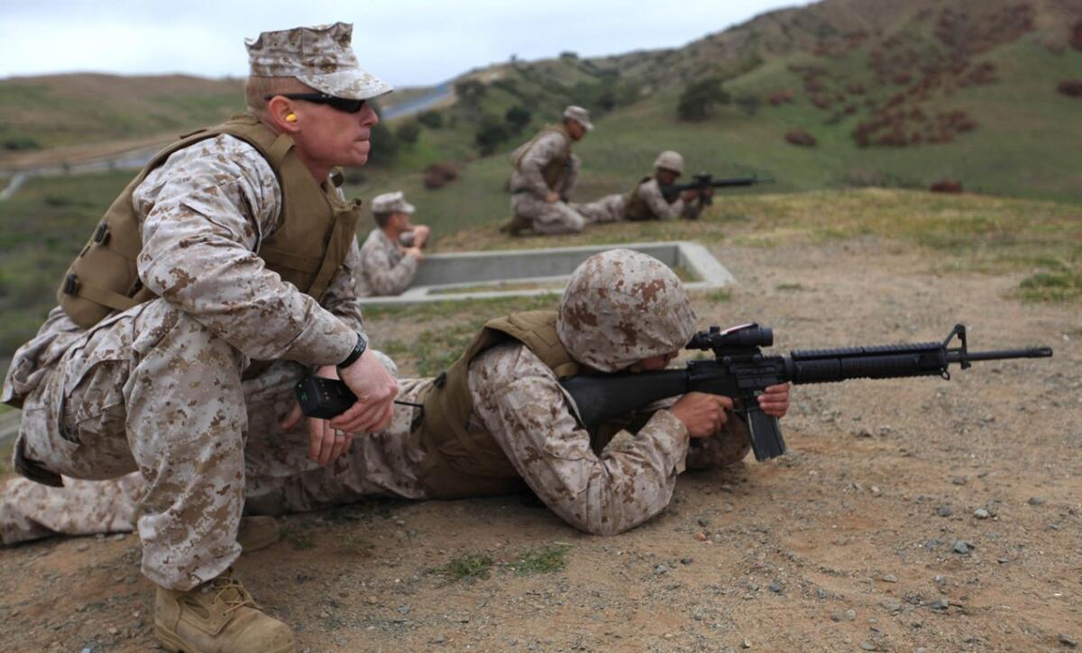 Sgt. Jeremy P. Sears in a live-fire training exercise at Camp Pendleton. Courtesy U.S. Marine Corps, by Lance Cpl. Derrick K. Irions
