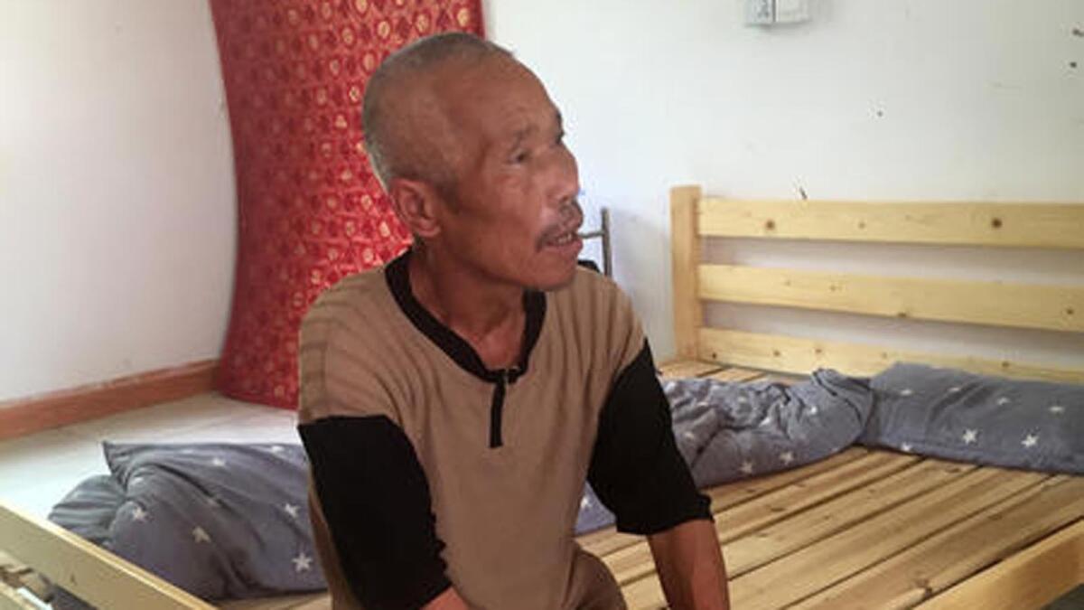 Ma Jixiang sits in his room at the Baishi Town Central Elderly Home in Hunan province, China.
