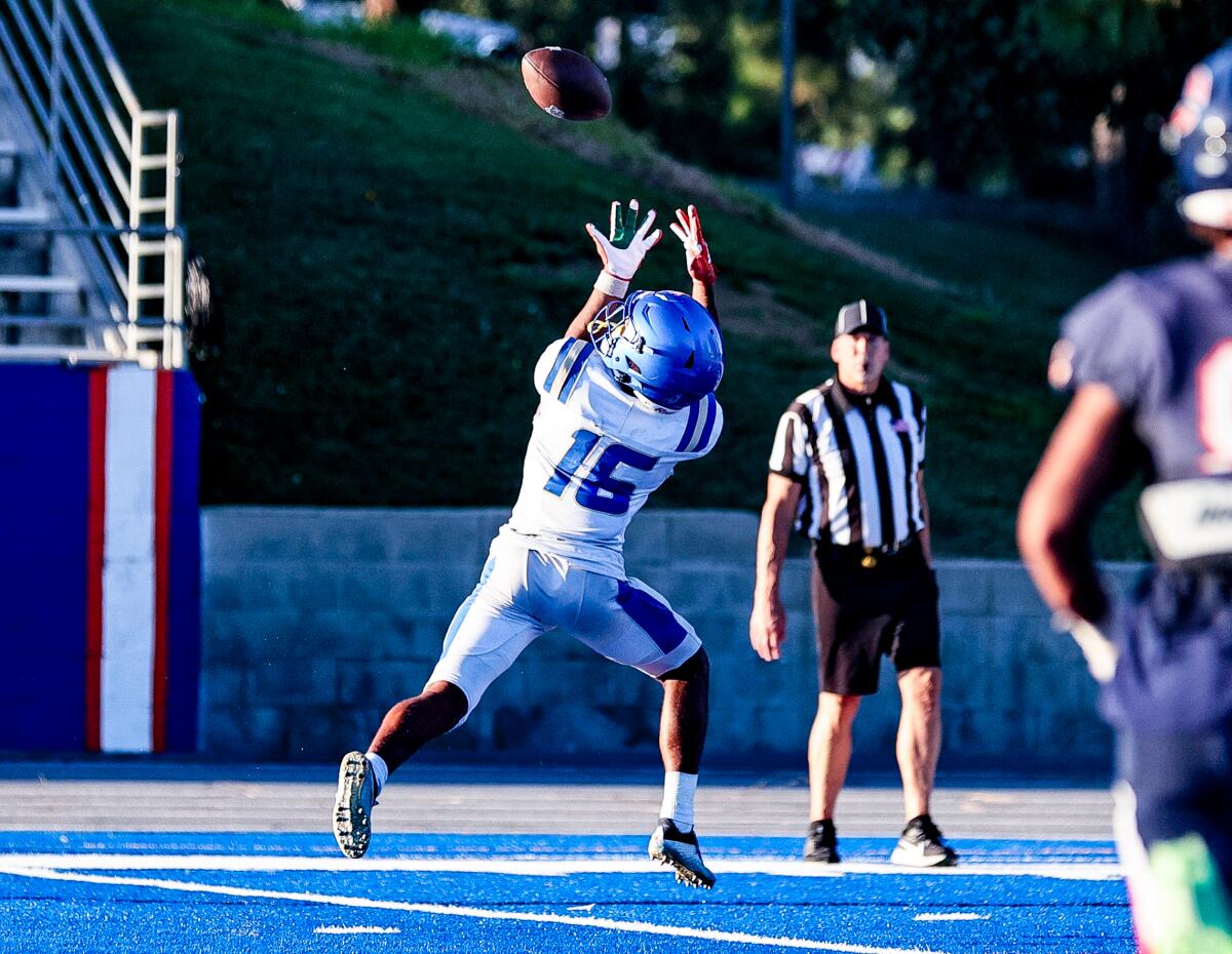 Santa Margarita High receiver Trent Mosley tries to make an over-the-shoulder catch.