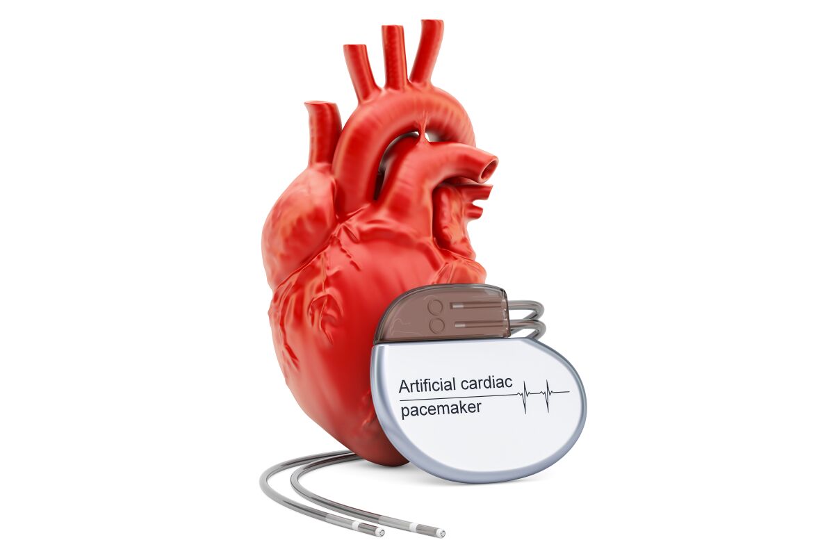 Artificial cardiac pacemaker with human heart, 3D rendering isolated on white background