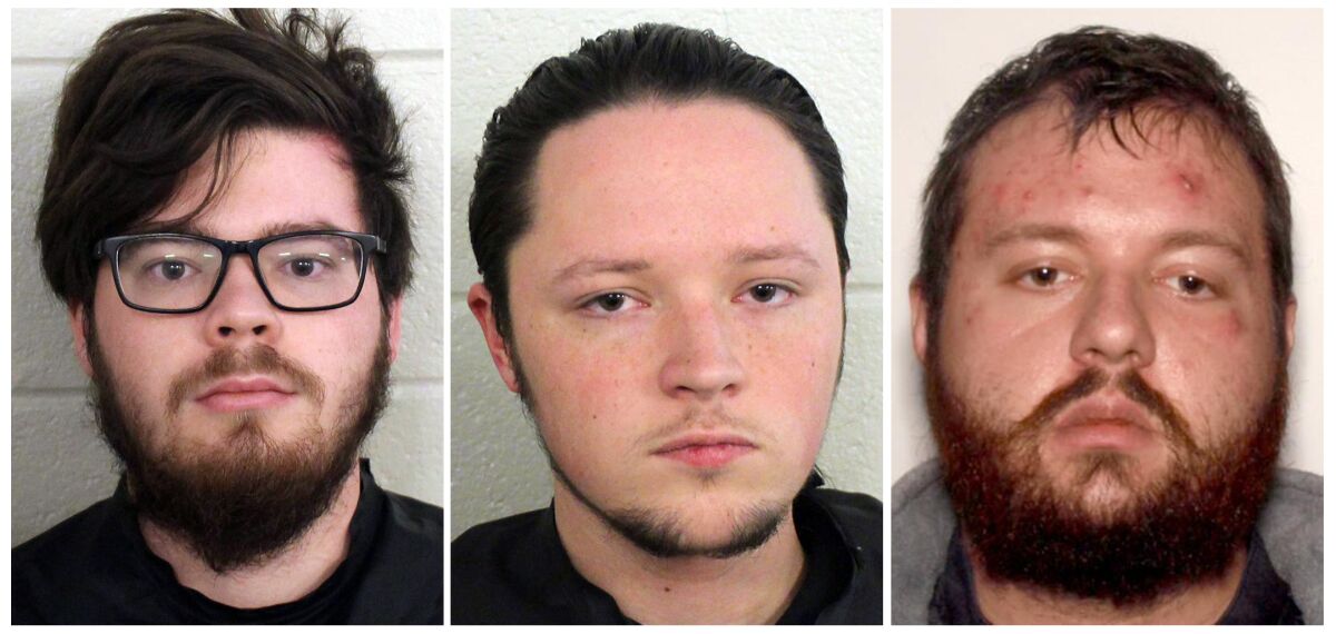 These undated photos provided by Floyd County, Ga., Police show from left, Luke Austin Lane of Floyd County, Jacob Kaderli of Dacula, and Michael Helterbrand of Dalton, Ga. FBI spokesman Kevin Rowson said Friday, Jan 20, 2020, that agents assisted in the arrests of the three Georgia men linked to The Base, a violent white supremacist group, on charges of conspiracy to commit murder and participating in a criminal street gang. Details of their cases have been sealed by a judge, Floyd County police Sgt. Chris Fincher said. (Floyd County Police via AP