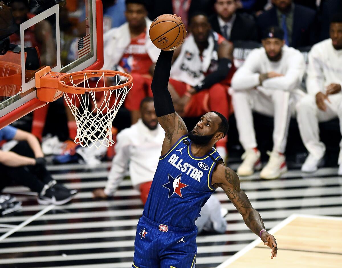CHICAGO, ILLINOIS - FEBRUARY 16: LeBron James #2 of Team LeBron dunks the ball in the third quarter against Team Giannis during the 69th NBA All-Star Game at the United Center on February 16, 2020 in Chicago, Illinois. NOTE TO USER: User expressly acknowledges and agrees that, by downloading and or using this photograph, User is consenting to the terms and conditions of the Getty Images License Agreement. (Photo by Stacy Revere/Getty Images) ** OUTS - ELSENT, FPG, CM - OUTS * NM, PH, VA if sourced by CT, LA or MoD **