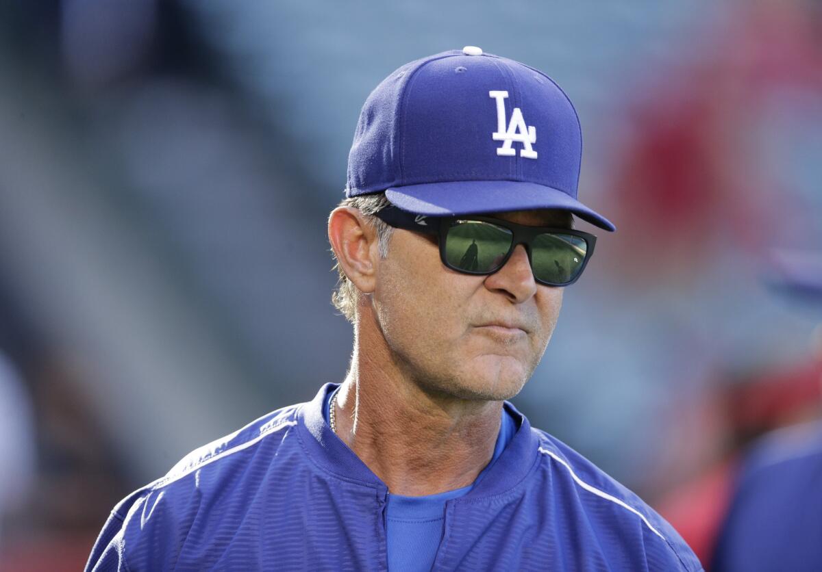 Dodgers Manager Don Mattingly has fond memories of Yogi Berra, whose No. 8 Mattingly adopted as his own when he joined the Dodgers.
