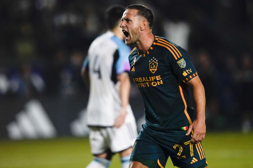 LA Galaxy forward Billy Sharp celebrates after scoring a goal against Minnesota United for a hat trick, during the second half of an MLS soccer match Wednesday, Sept. 20, 2023, in Carson, Calif. (AP Photo/Ryan Sun)