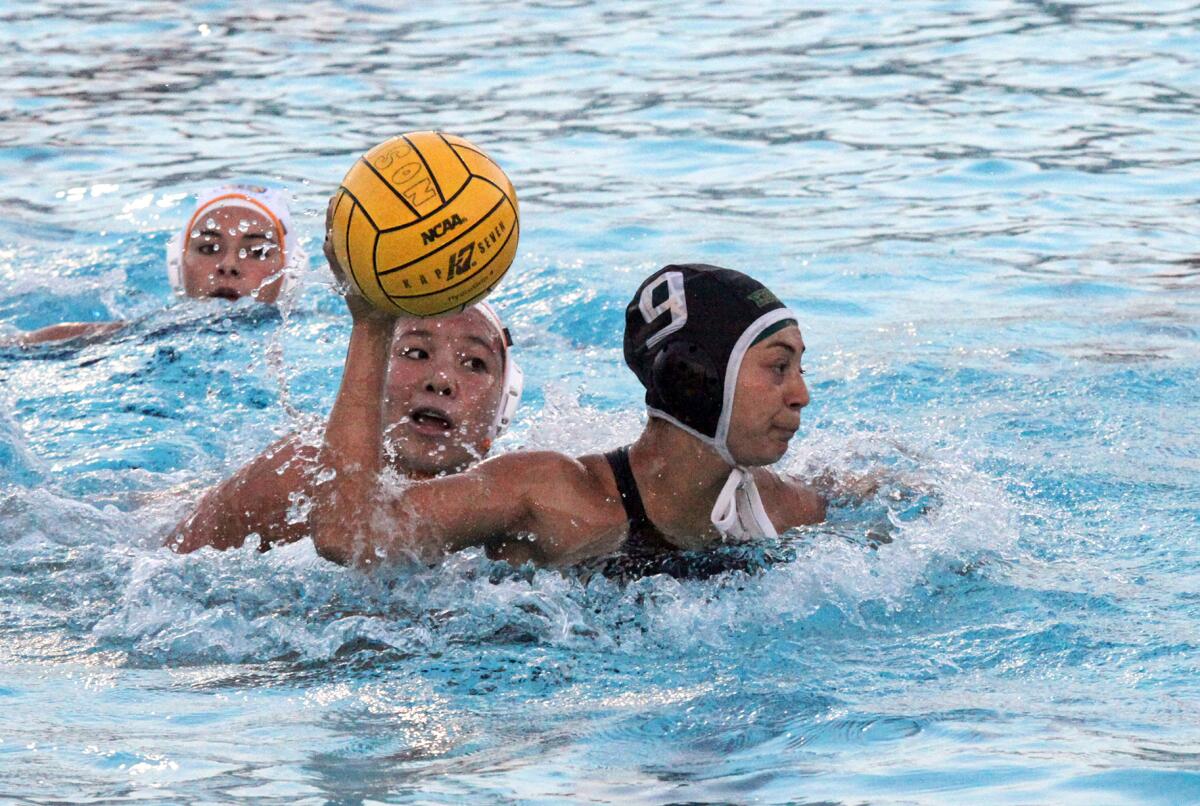 Edison High's Lily Worley (9) makes the first goal against Fountain Valley in Tuesday night's Wave League match.