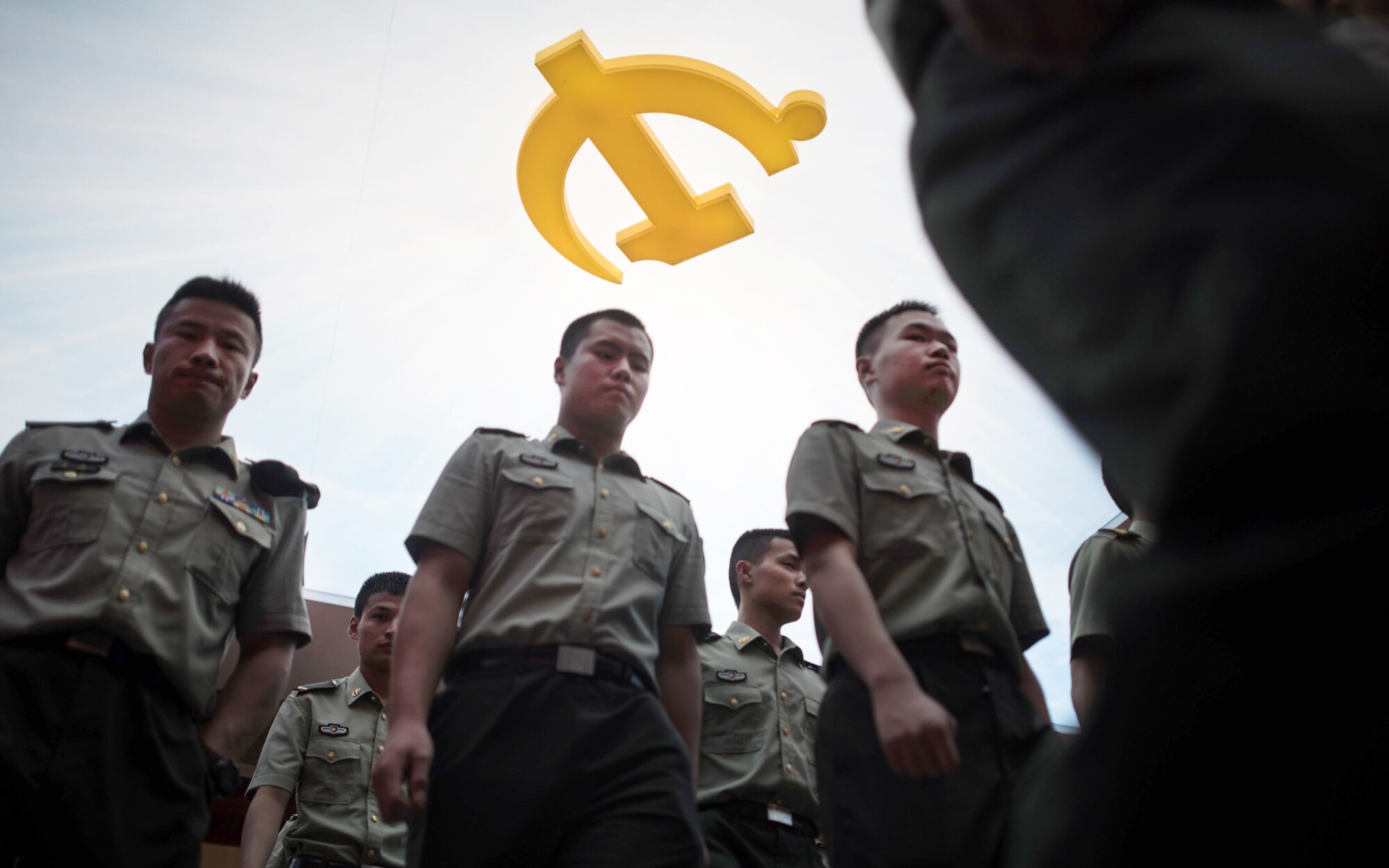 Chinese troops visit an exhibition marking the 90th anniversary of the army's founding in Beijing.