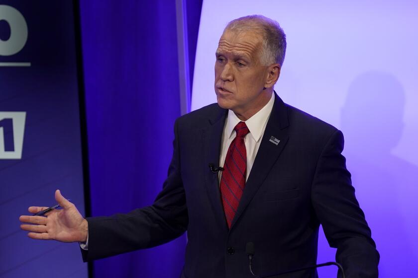 FILE-In this Thursday, Oct. 1, 2020 file photo, U.S. Sen. Thom Tillis, R-N.C., speaks during a televised debate with Democratic challenger Cal Cunningham, in Raleigh, N.C. (AP Photo/Gerry Broome, Pool)