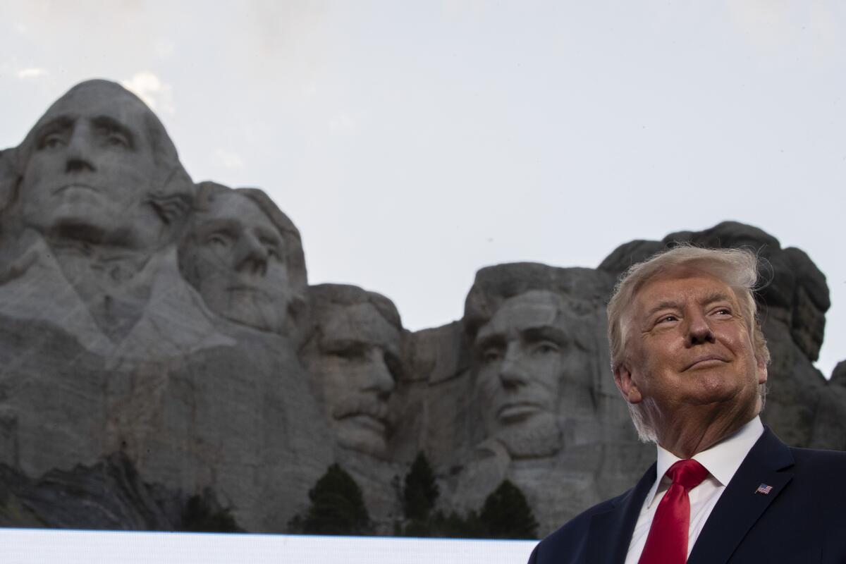 President Trump with Mt. Rushmore in the background. 