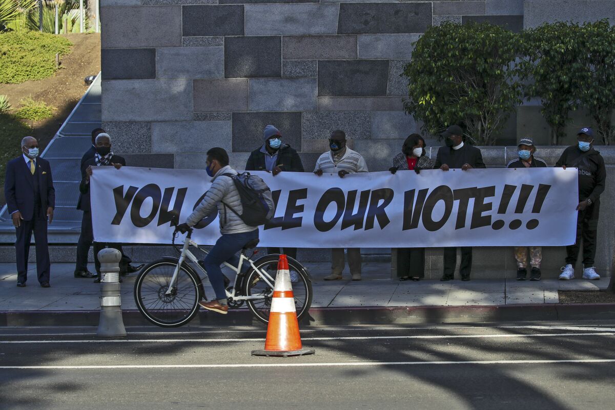 Black leaders rally outside L.A. City Hall last week.