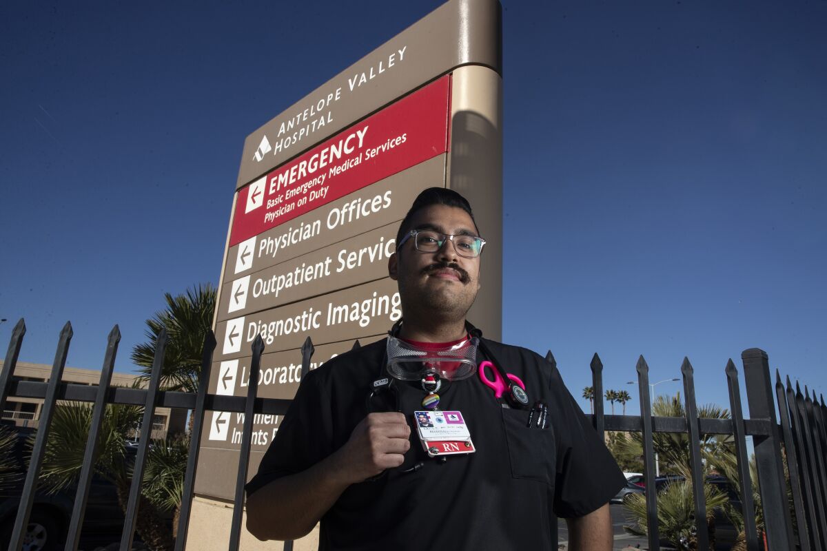 Emergency room nurse Erick Fernandez stands in front of Antelope Valley Hospital in Lancaster. 