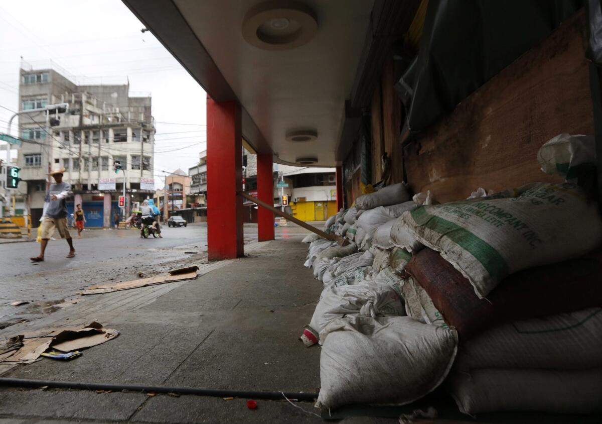 Sandbags are in place in anticipation of floods in Tacloban, Philippines, from Typhoon Haqupit.